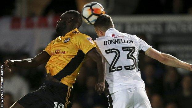 League Two Newport claimed the scalp of League One Walsall in the FA Cup first round