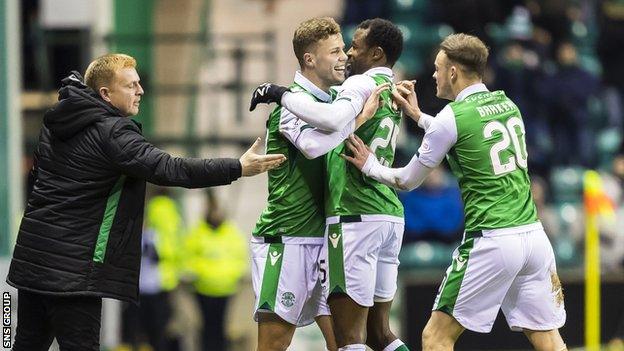 Manager Neil Lennon joins in the celebrations after Florian Kamberi fired in the opener