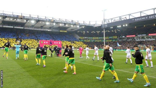 Norwich fans held up blue and yellow cards to form a Ukrainian flag at Carrow Road