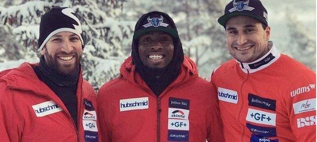 Joel Fear (centre) with Swiss bobsleighers