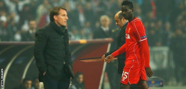 Mario Balotelli looks at Liverpool manager Brendan Rodgers with anger after being substituted in the Europa League match with Besiktas in 2015