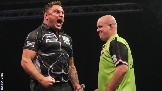 Gerwyn Price celebrates as he beats Michael van Gerwen