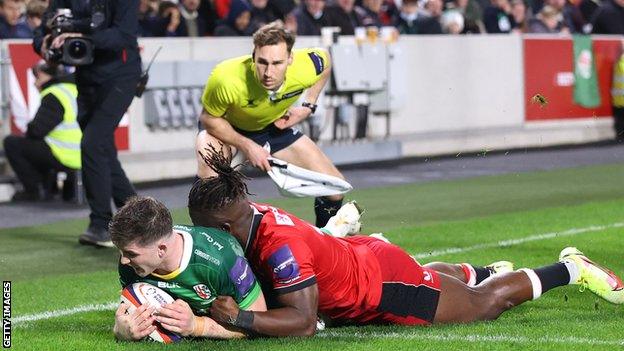 London Irish's Cillian Redmond scores a try