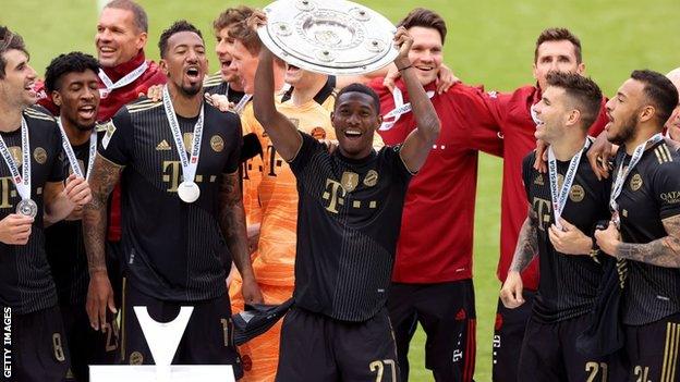 David Alaba celebrates winning Bundesliga Meisterschale Trophy with Bayern Munich