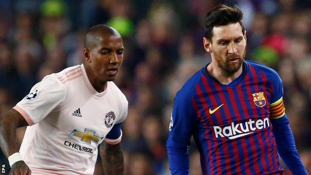 Manchester United defender Ashley Young (left) and Barcelona forward Lionel Messi