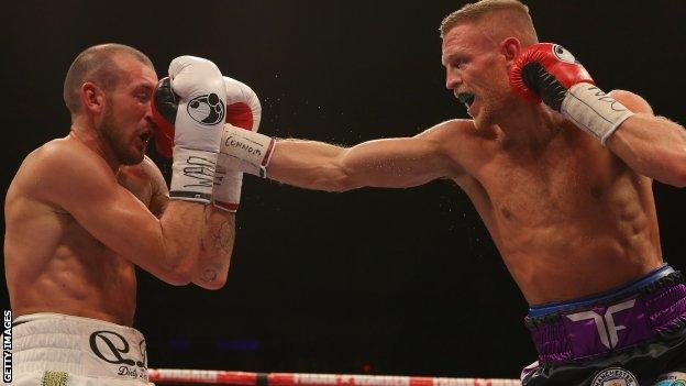 Derry Matthews is punched in the face by Terry Flanagan