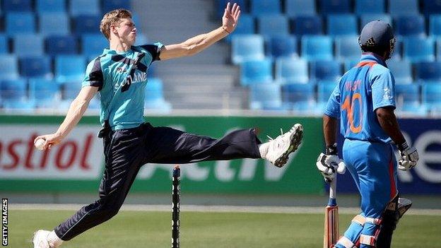 Gavin Main bowls for Scotland at the Under-19 World Cup in Dubai in 2014