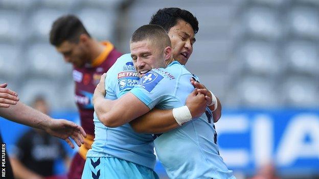 Wakefield stand-off Mason Lino, who kicked successfully six times, celebrates with try scorer Ryan Hampshire