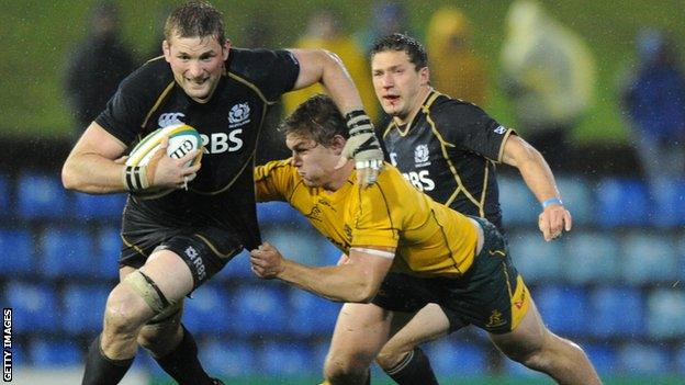 Scotland's John Barclay is tackled by David Pocock of Australia