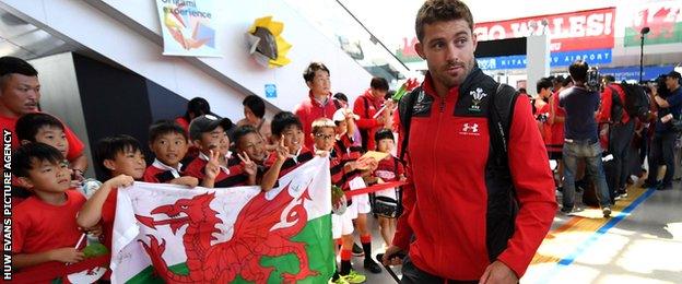 Children and local media welcome Leigh Halfpenny and the rest of the Wales squad at Kitakyushu Airport