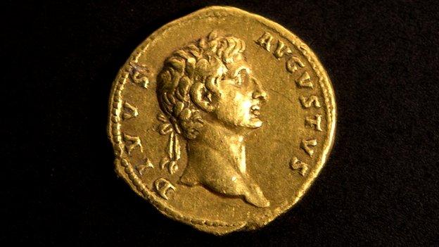 A rare gold coin bearing the image of the first Roman emperor, Augustus.