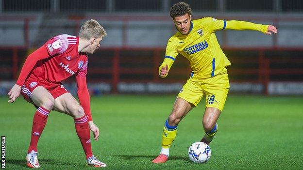 AFC Wimbledon defender Nesta Guinness-Walker in possession