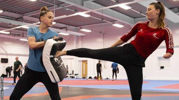 Beth Munro and Amy Truesdale in taekwondo training