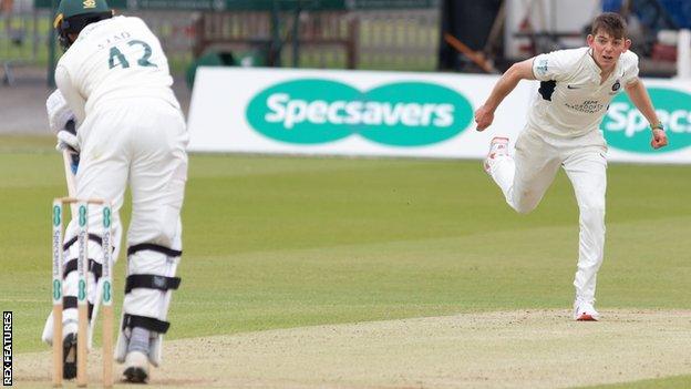 Ethan Bamber bowling against Leicestershire