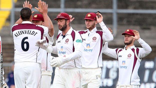 Northants celebrate taking a Glamorgan wicket