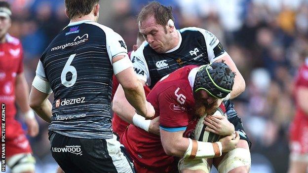 Jake Ball is tackled by Alun Wyn Jones during the Ospreys v Scarlets match on 22 December 2018