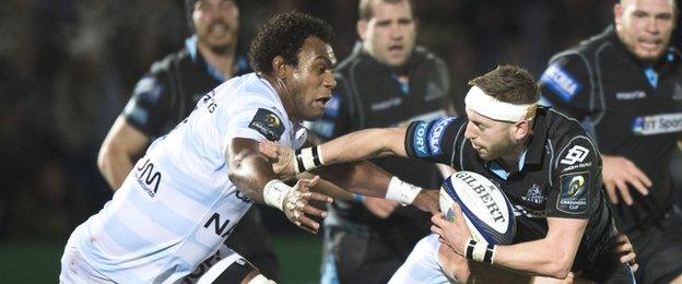 Racing 92 lock Leone Nakarawa tries to tackle Glasgow's Finn Russell