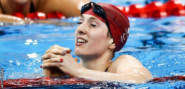 Bethany Firth celebrating her victory in the women's S14 200m freestyle