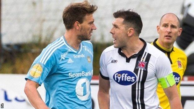 Rosenborg striker Nicklas Bendtner squares up to Dundalk captain Brian Gartland