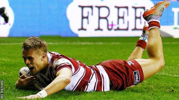 Lewis Tierney scores Wigan's first-half try against Hull KR