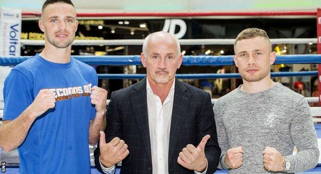 Barry McGuigan is flanked by Josh Taylor and Carl Frampton