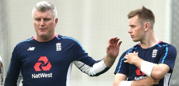 Stuart MacGill works with Mason Crane in the nets