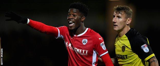 Barnsley's Ike Ugbo in action against Burton