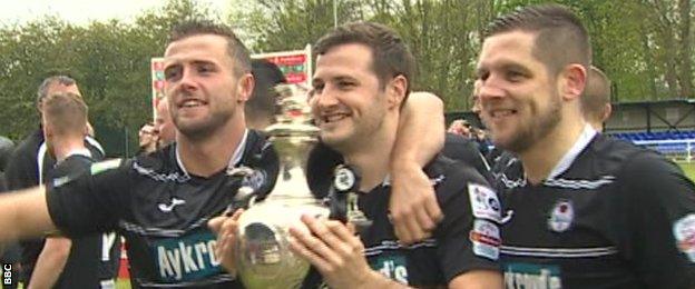 Bala players Anthony Stephens, Ian Sheridan and Mark Connolly celebrate with the Welsh Cup