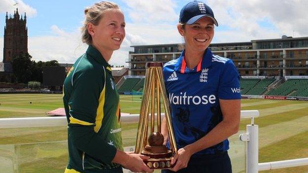 Captains Meg Lanning and Charlotte Edwards with the Women's Ashes trophy