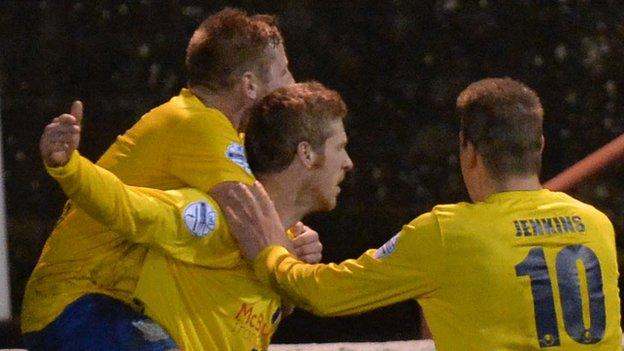 Darren Henderson is congratulated after scoring one of Ballymena's goals at Inver Park