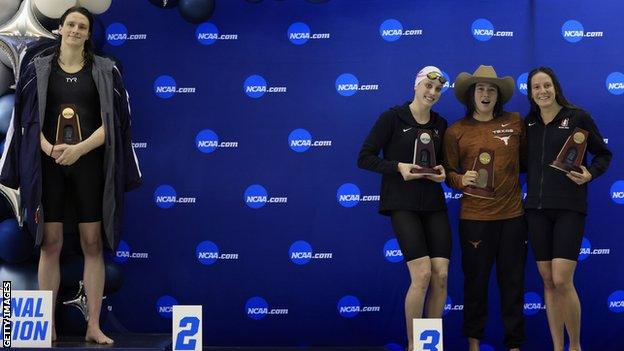 Lia Thomas becomes first known transgender athlete to win NCAA swimming title - BBC Sport