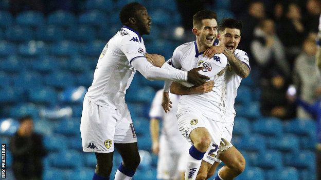 Lewis Cook celebrates scoring for Leeds against Fulham