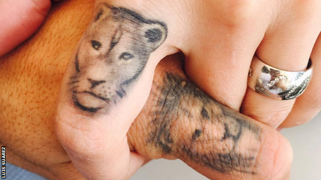 A lion and lioness tattoo