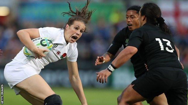 England's Emily Scarratt takes on the New Zealand defence