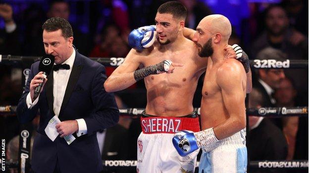 Bradley Skeete hugs Hamzah Sheeraz