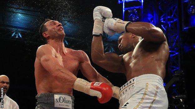 Anthony Joshua (right) lands a punch on Wladimir Klitschko