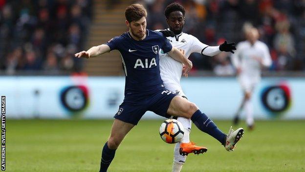 Ben Davies and Nathan Dyer battle for the ball during the FA Cup Quarter Final between Swansea City and Tottenham Hotspur