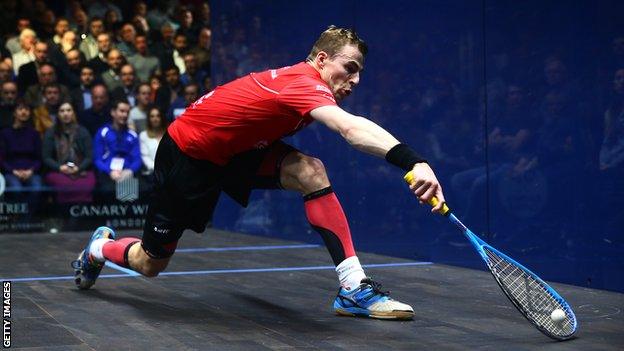 Nick Matthew reaches for a backhand during a squash match