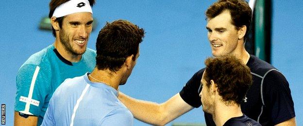 Andy Murray (R) and Jamie Murray (2R) of Britain celebrate after winning the doubles match against Juan Martin del Potro (2L) and Leonardo Mayer (L) of Argentina