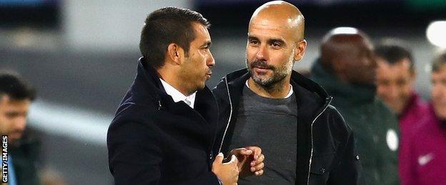 Feyenoord's Giovanni van Bronckhorst and Manchester City's Pep Guardiola