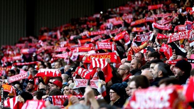 Liverpool fans sing before kick off at a friendly match between Liverpool Legends and FC Bayern Legends this month