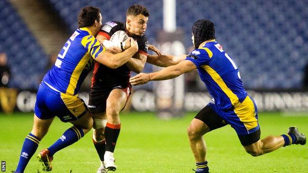 Edinburgh's Damien Hoyland is tackled by Zebre's Tommaso Boni (left) and Tommasi Castello