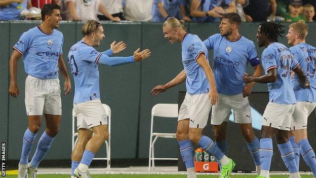 Erling Haaland celebrates his goal with teammates