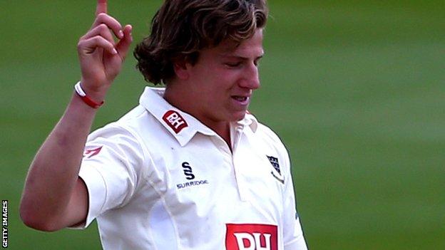 Matthew Hobden celebrates after taking a wicket against Hampshire in June