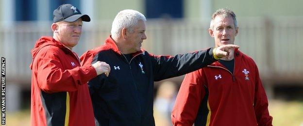 Wales coaches Neil Jenkins (left), Warren Gatland (centre) and Rob Howley oversee training in Colwyn Bay