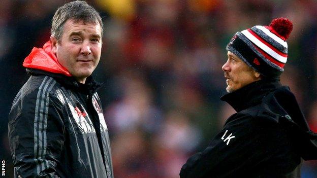 Anthony Foley and Ulster director of rugby Les in discussion at Kingspan Stadium in January