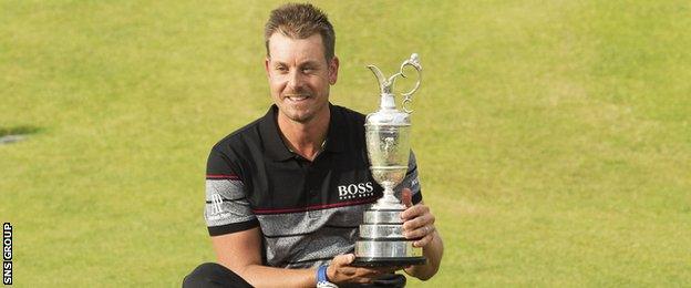 Henrik Stenson with the Claret Jug