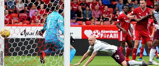 Steven Naismith dives in to head Hearts level at Pittodrie