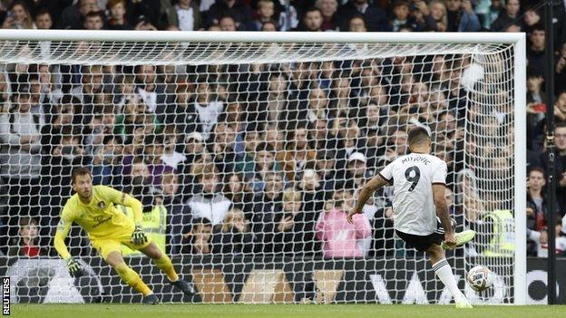 Aleksandar Mitrovic scores from the penalty spot