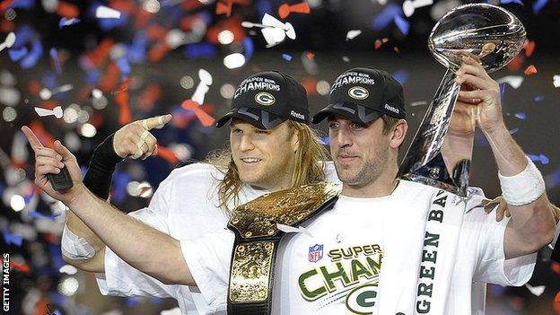 Aaron Rodgers with the Lombardi Trophy in 2011